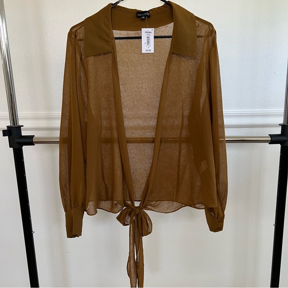 Long sleeve sheer open front with tie blouse